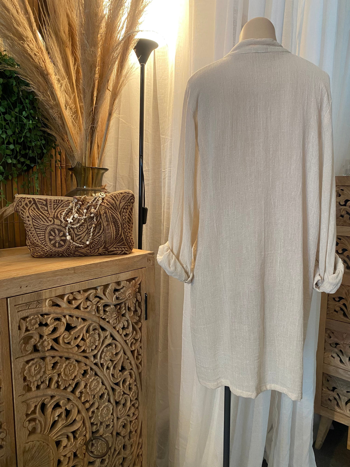 Back view of women’s ramie fabric long shirt made from natural fibre
