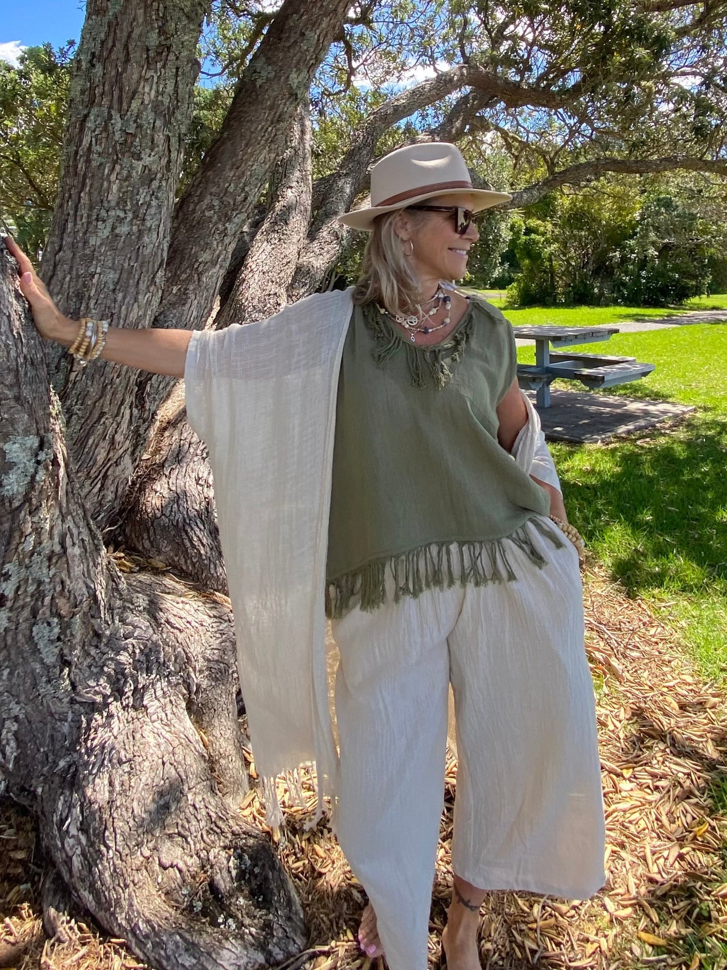 Women’s natural fibre long pocket pants by SUKAAH designed in breathable ramie fabric for comfort and warm climates