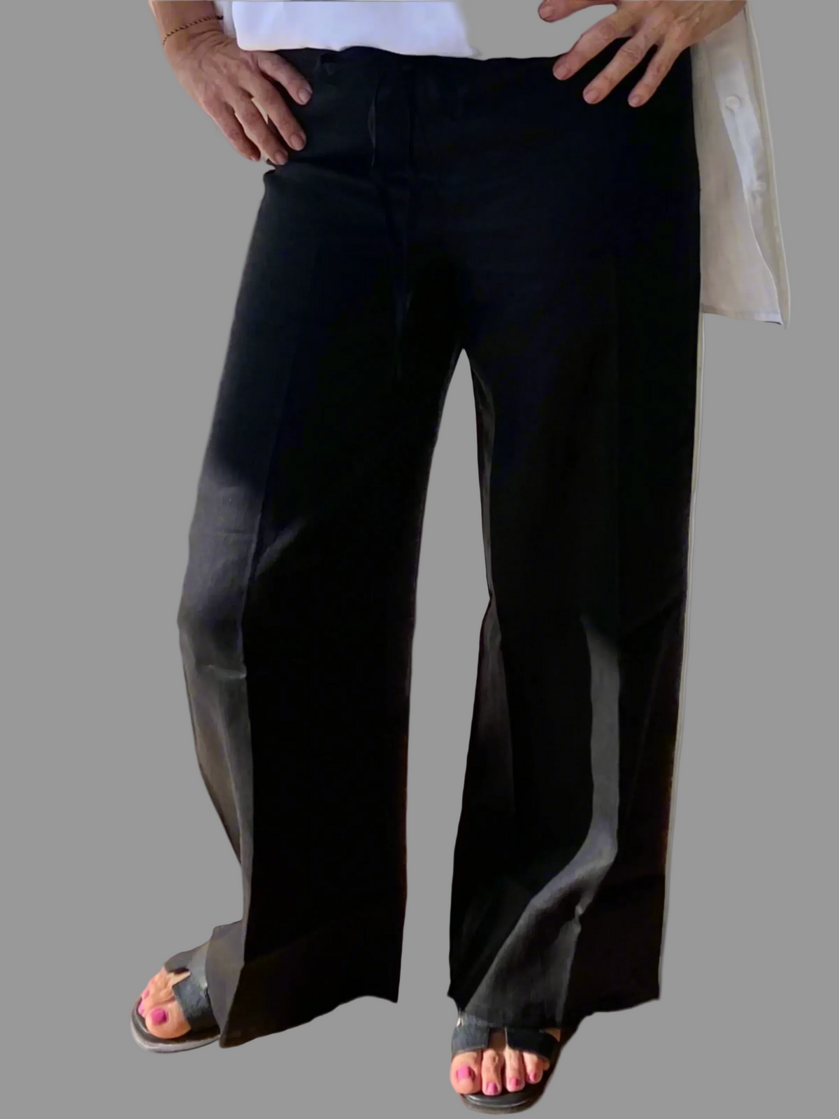 SUKAAH black linen pants styled for elevated summer evenings