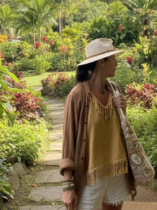 Woman wearing SUKAAH ramie natural fibre Korean cover-up shirt in brown – tropical garden