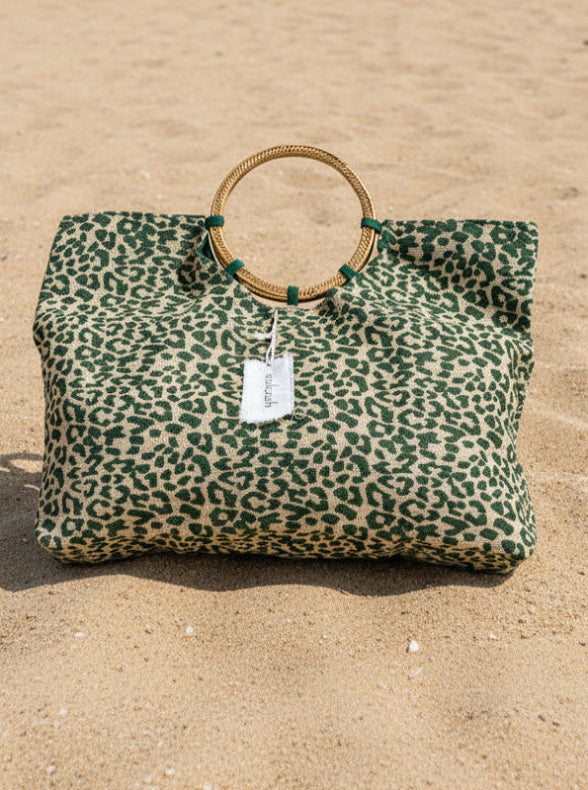 Green lepoard print bag made from natural hesian by sukaah with rattan handle 