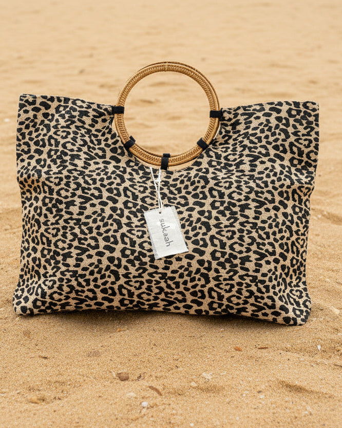 sukaah Black rattan handle lepoard print bag made from hesian 