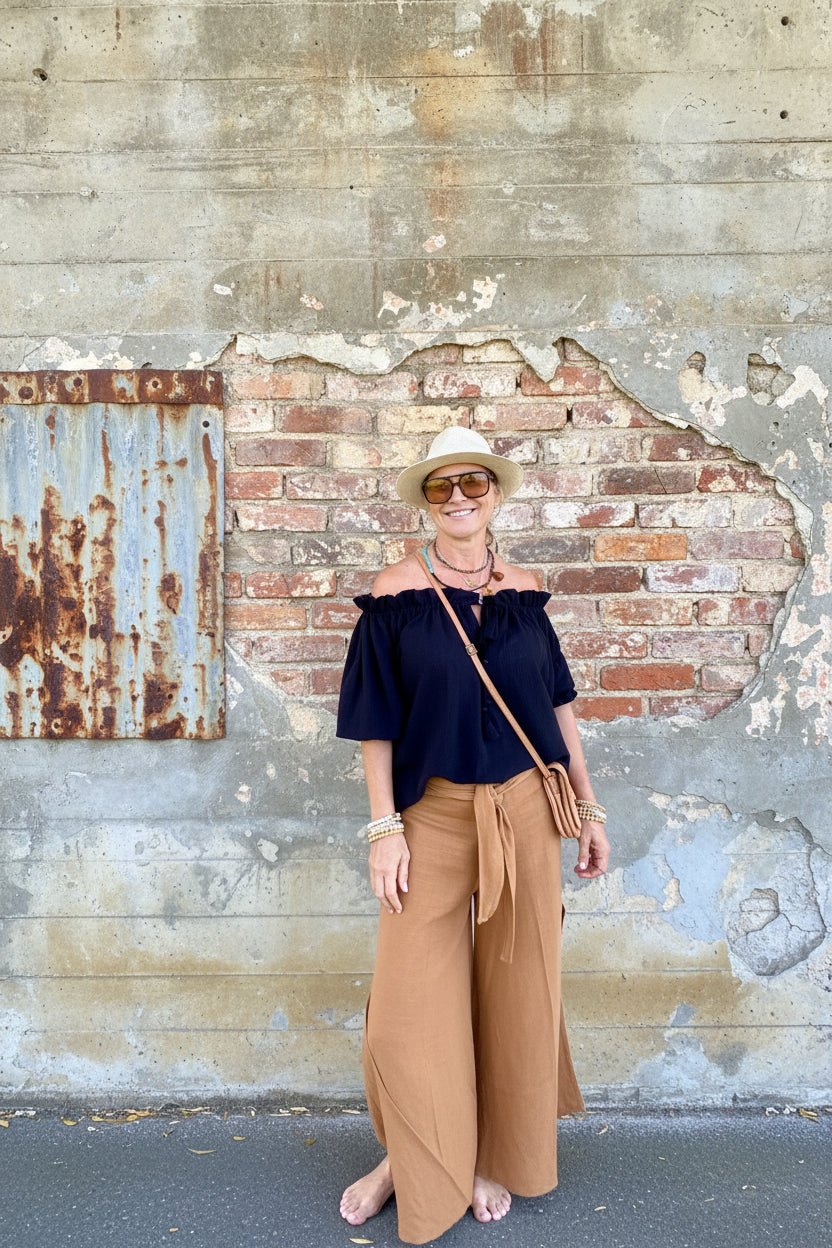 Sukaah women’s  brown ramie resort pants in natural fibre with relaxed wide leg silhouette.