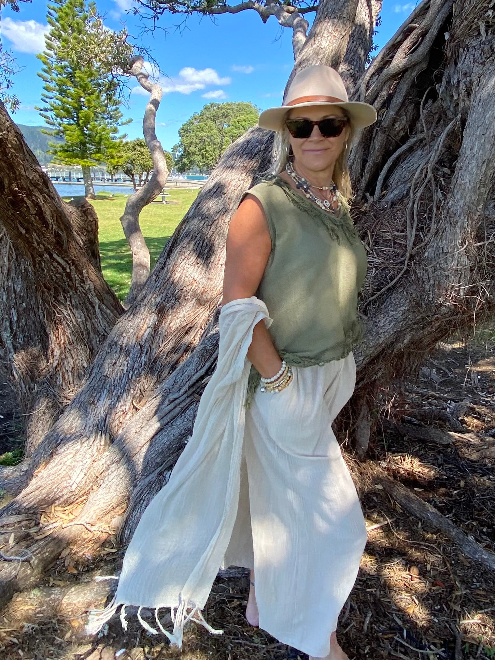 SUKAAH women’s long pocket pants in natural ramie fabric with relaxed wide-leg fit and breathable resort style