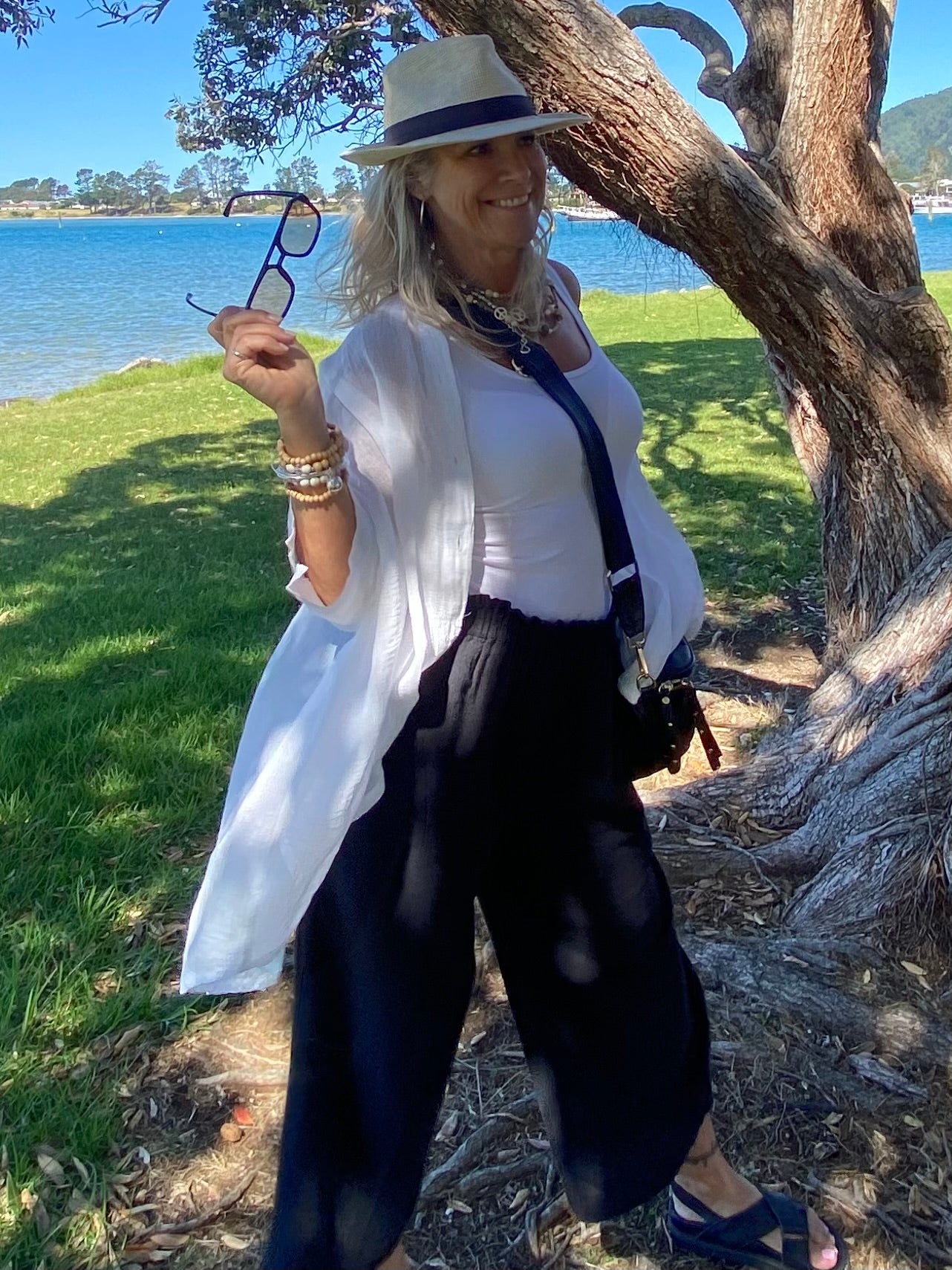 Sukaah high-waisted long ramie pants in soft neutral tone for elevated everyday wear.