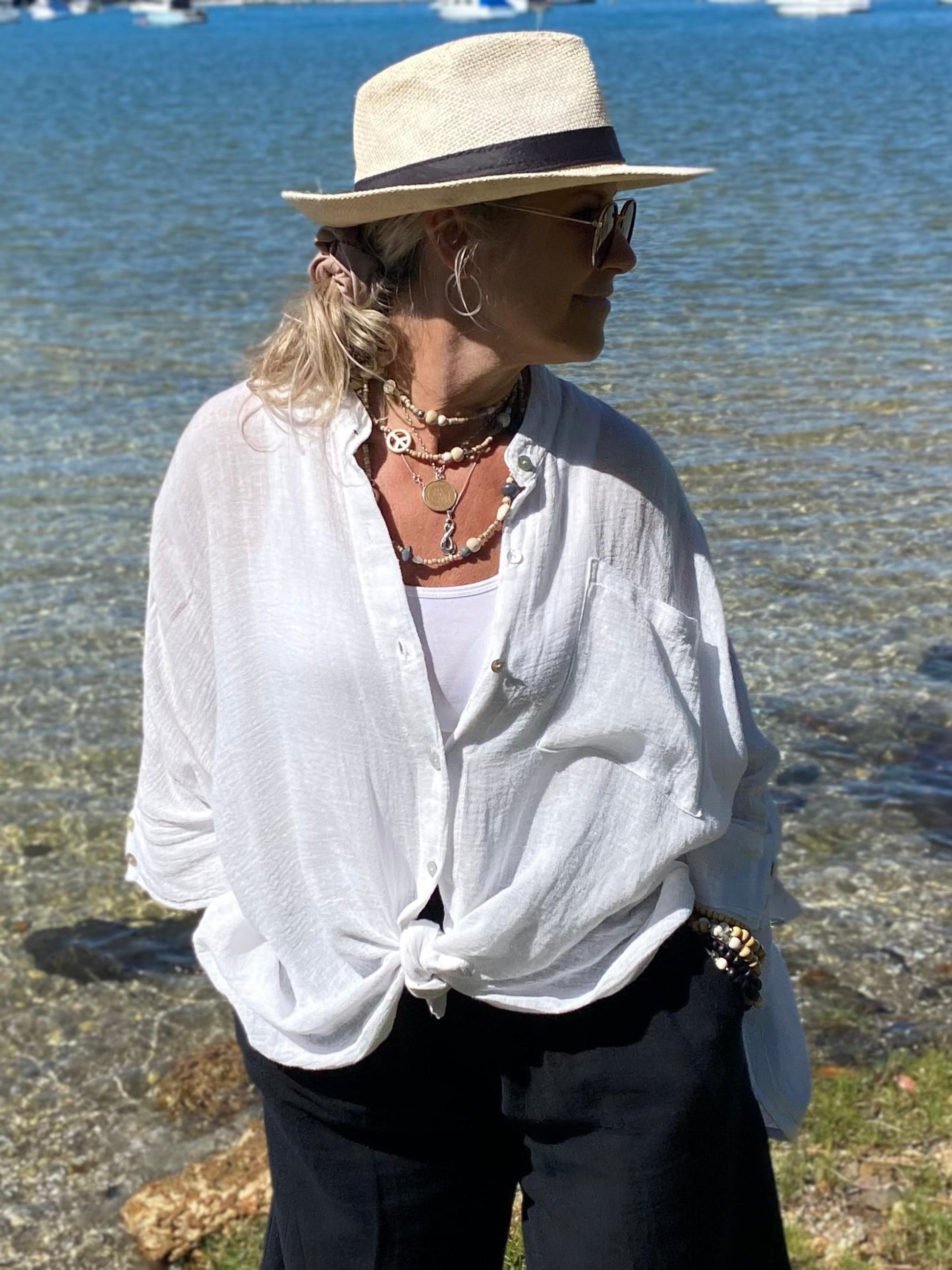 Woman wearing SUKAAH Isabella Bag Shirt in white – lightweight ramie natural fibre clothing