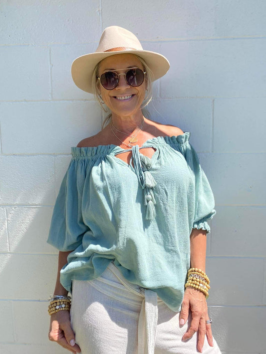 Sukaah off-shoulder ramie blouse in breathable natural fibre designed for warm Australian climates.