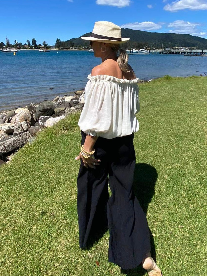 Sukaah eco-conscious ramie wide leg black pants crafted for warm climate comfort.