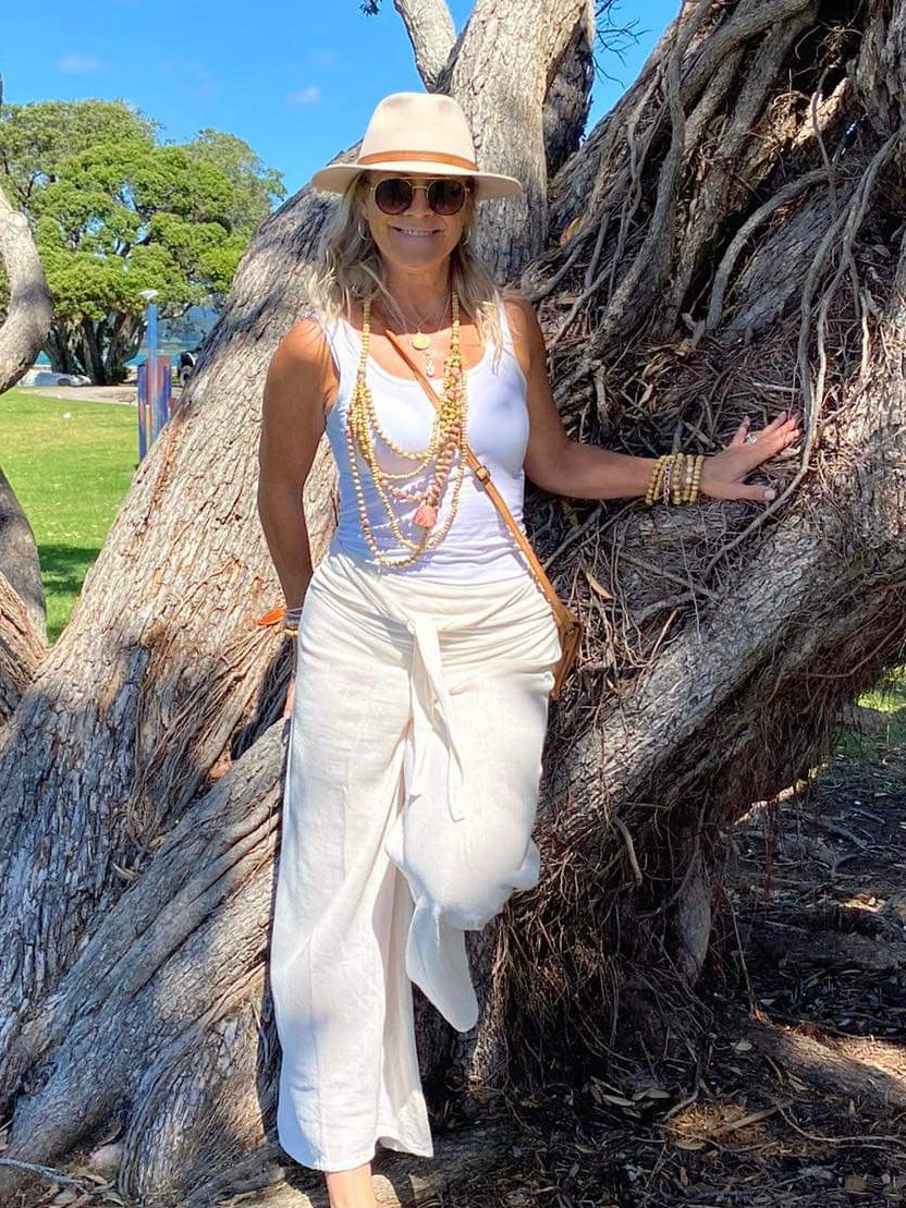 Sukaah high-rise ramie resort pants in earthy tone for elevated summer styling. Natural in colour 