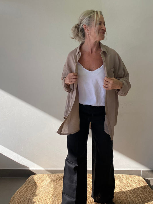 Oversized cotton linen blend shirt worn open with relaxed black linen pants |sukaah