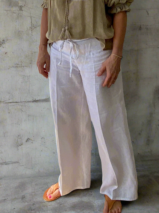 Close-up of breathable linen fabric and relaxed fit resort pants